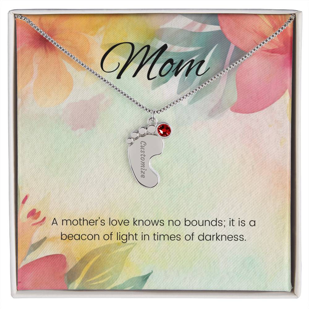 A mother's love knows no bounds...Engraved Baby Feet Necklace with Birthstone