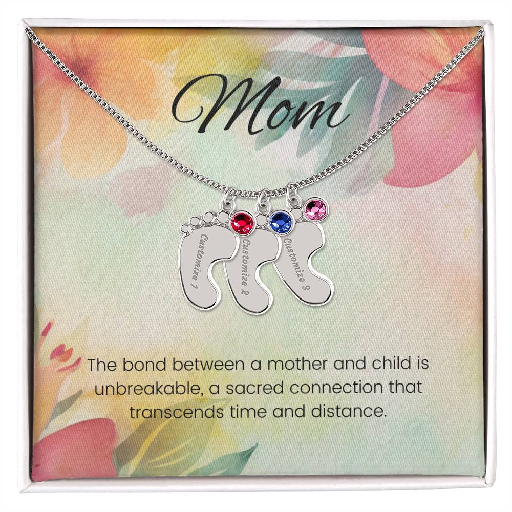 The bond between a mother and child...Engraved Baby Feet Necklace with Birthstone