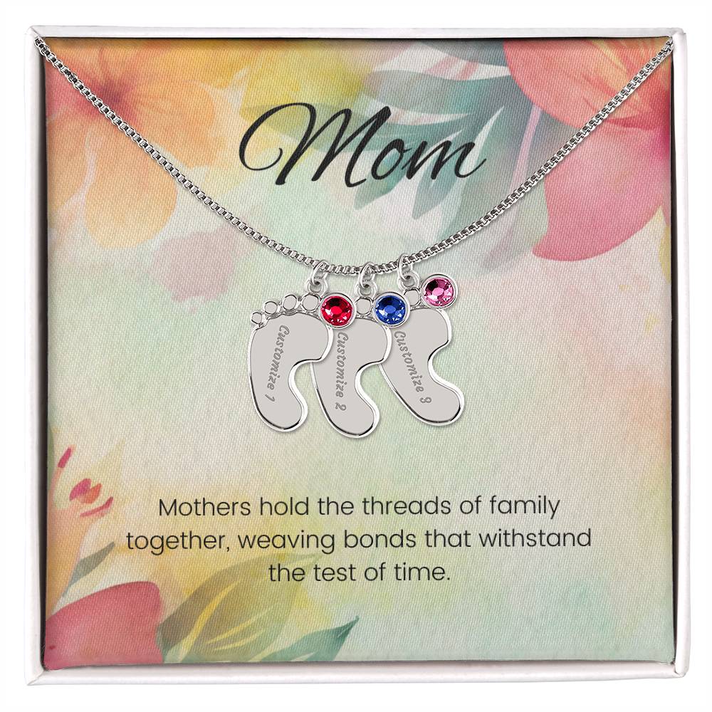 Mothers hold the threads of family together...Engraved Baby Feet Necklace with Birthstone