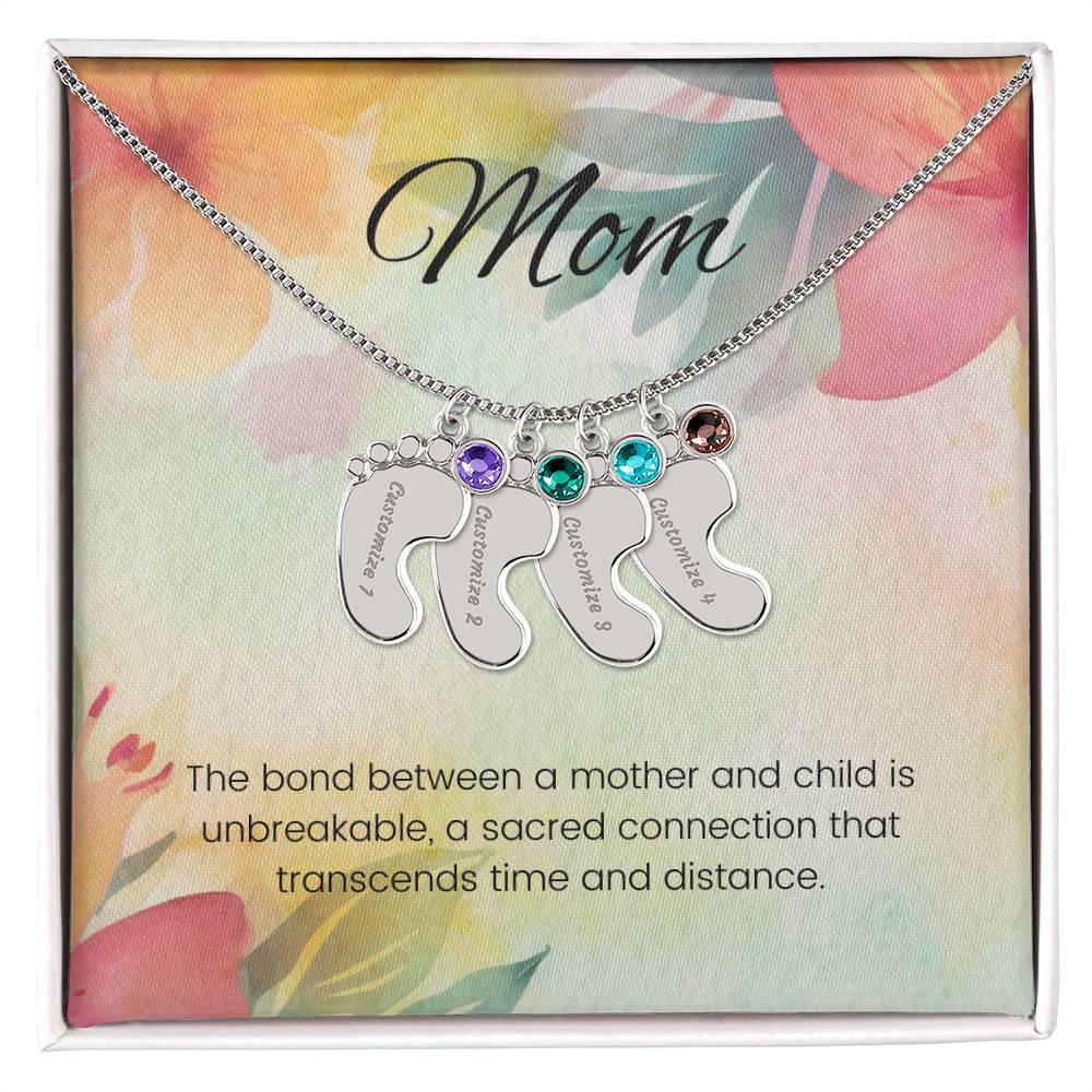 The bond between a mother and child...Engraved Baby Feet Necklace with Birthstone