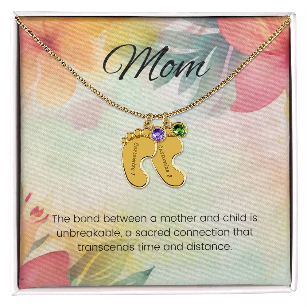 The bond between a mother and child...Engraved Baby Feet Necklace with Birthstone