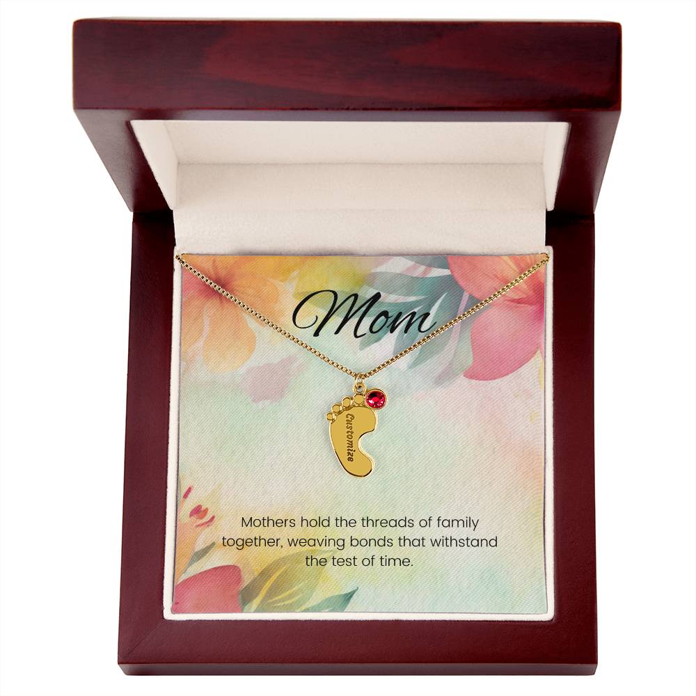 Mothers hold the threads of family together...Engraved Baby Feet Necklace with Birthstone